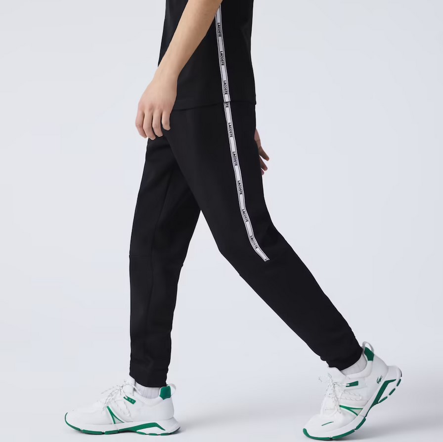Pantalon de jogging fuselé Lacoste en molleton avec bandes siglées noir