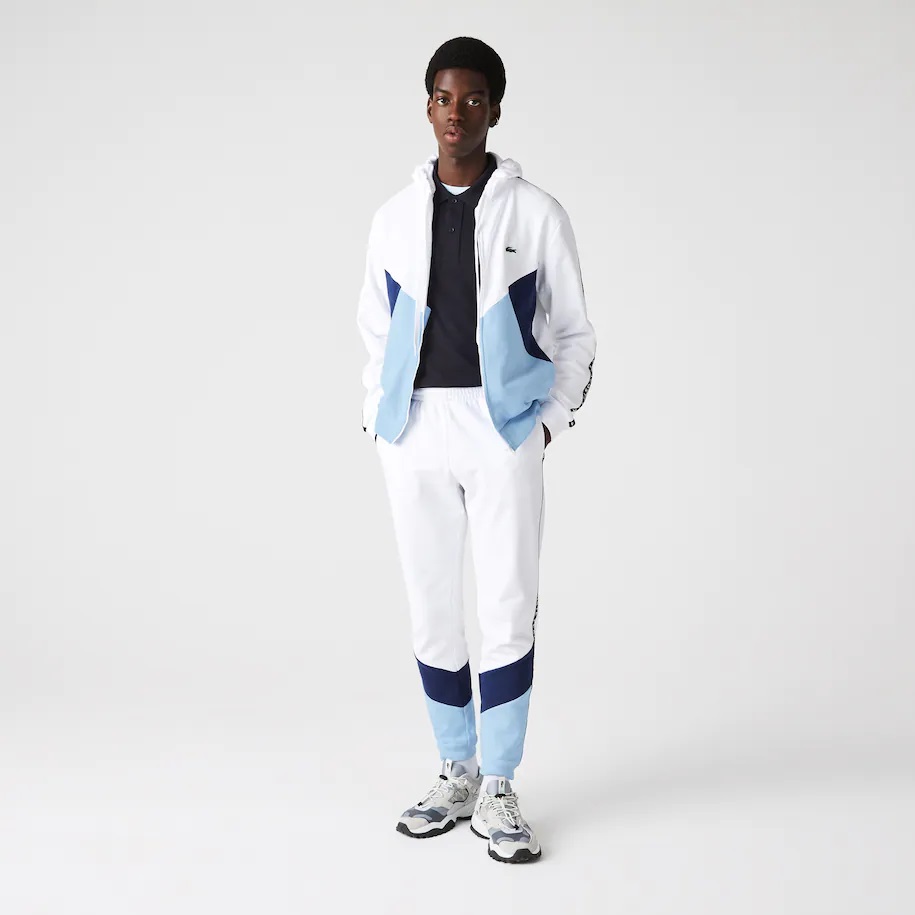 Pantalon de jogging Lacoste en molleton color-block avec bandes siglées Blanc/Bleu