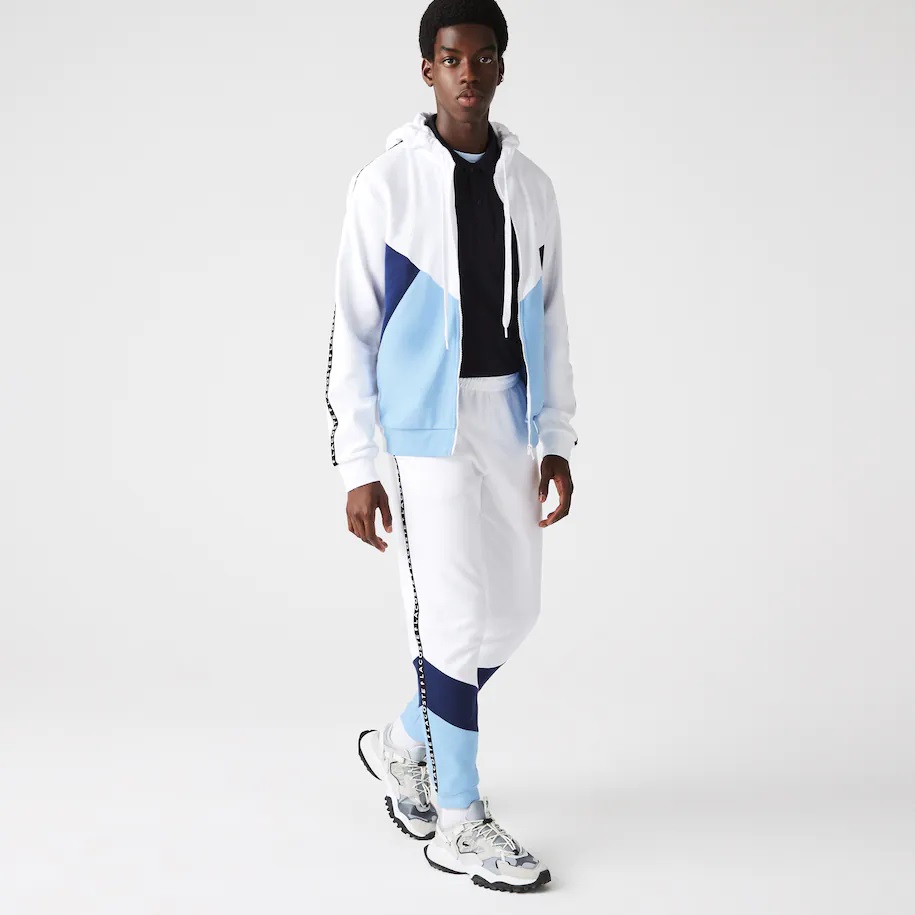 Pantalon de jogging Lacoste en molleton color-block avec bandes siglées Blanc/Bleu