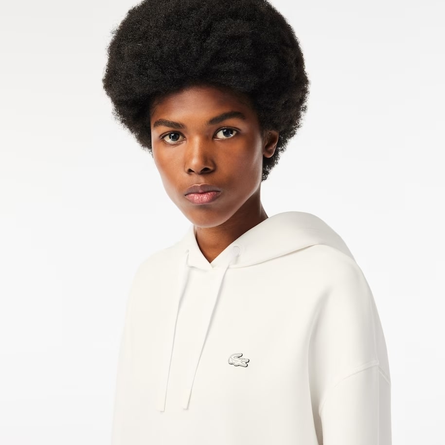 Sweatshirt à capuche JOGGER Femme Lacoste avec passe-pouce Blanc : Un Mélange de Style et de Confort