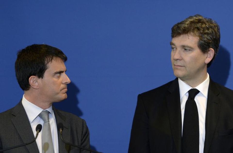 Manuel Valls et Arnaud Montebourg, le 12 mai 2014 à Faverges. Photo Philippe Desmazes. AFP