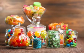 Comment le bonbon est-il devenu un symbole de la gourmandise enfantine ? 