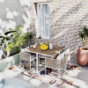 Table de Jardin SWANN 4 personnes (x2) en composite imitation teck et fauteuils encastrables (x4) en résine recyclée imitation rotin de Maisons du Monde : Réduction de -20% 
